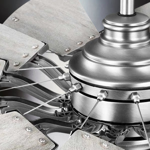 A close-up of the UHP9481 Tuscan Indoor Ceiling Fan by Urban Ambiance features a metallic design with multiple blades and intricate wire connectors, reminiscent of the rustic aesthetics in the Saybrook Collection. This fan measures 24-1/8''H x 52