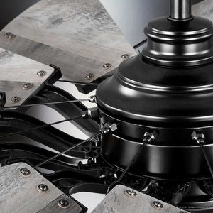 Close-up of the Urban Ambiance UHP9482 Tuscan Ceiling Fan from the Saybrook Collection in matte black, highlighting uniquely crafted metal blades with visible screws and rods and a central motor housing. Size: 24-1/8''H x 52