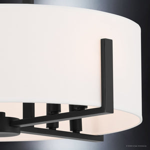 Close-up of the Urban Ambiance UKC20373 Transitional Indoor Ceiling Light from the Oakmont Collection, featuring a black finish frame and a drum-shaped fabric shade; measures 14.5''H x 20''W x 20''D.