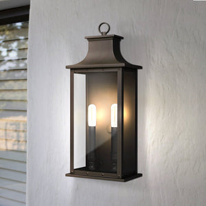 The Urban Ambiance UQL1720 Classic Outdoor Wall Sconce from the Halle Collection features marine-grade, old bronze construction and beveled glass panels, measuring 19.50"H x 8.25"W x 6.50"D.