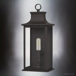 The Urban Ambiance UQL1721 Classic Outdoor Wall Sconce from the Halle Collection features a marine-grade, old bronze finish, clear beveled glass panels, and a single exposed bulb (15.5