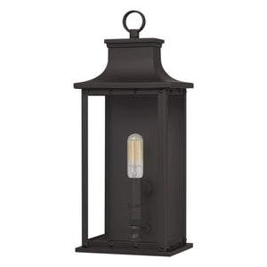 The Urban Ambiance UQL1721 Classic Outdoor Wall Sconce from the Halle Collection features a rectangular design (15.50''H x 6.50''W x 5.50''D), old bronze finish, clear glass, and marine-grade construction for timeless exterior style.