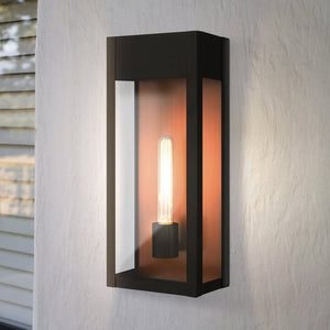The Urban Ambiance UQL1800 Luxe Industrial Outdoor Wall Sconce, 18"H, matte black, from the Kingsley Collection features marine-grade construction and adds bold industrial style to any white textured wall.