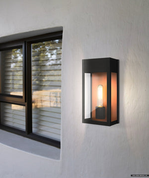 The Urban Ambiance UQL1801 Luxe Industrial Outdoor Wall Sconce, 13''H x 6''W x 5.5''D in matte black from the Kingsley Collection, features marine-grade construction for stylish, durable exterior lighting beside your window.