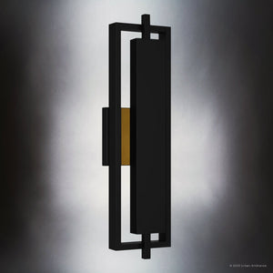 The UQL1840 Modern Outdoor Wall Sconce by Urban Ambiance features a geometric design, matte black finish, and marine-grade construction (20.50''H x 5.75''W x 3.75''D), creating soft gradient lighting for stylish outdoor spaces.
