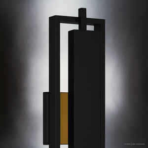 The Urban Ambiance UQL1840 Modern Outdoor Wall Sconce from the Juniper Collection features a matte black finish, geometric design, marine-grade construction, and integrated LED for stylish, durable outdoor lighting. Measures 20.50''H x 5.75''W x 3.75''D.