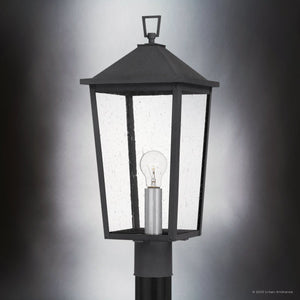 The Urban Ambiance UQL1874 Modern Rustic Outdoor Post Light from the Elmwood Collection features a mottled black marine-grade finish and clear seeded glass, measuring 22''H x 9.25''W x 9.25''D, shown against a gradient gray background.