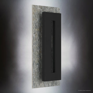 The UQL1880 Luxe Industrial Outdoor Wall Sconce by Urban Ambiance features marine-grade construction, an earth black finish, and a bold rectangular design for striking architectural lighting. Part of the Burnie Collection, it measures 18.25''H x 8.00''W x 3.75''D.