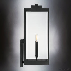 The Urban Ambiance Quincy Collection UQL1892 Modern Farmhouse Outdoor Wall Sconce features a rectangular design in a natural black finish with an exposed bulb, shown against a white to gray gradient background. Dimensions: 22.75''H x 9.00''W x 10.25''D.