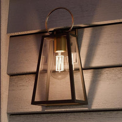 A luxury lighting fixture, the UHP1002 Modern Farmhouse Outdoor Wall Light from the Vicenza Collection by Urban Ambiance adds a touch of elegance to any house.