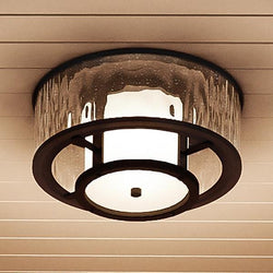 A gorgeous UHP1014 Nautical Outdoor Ceiling Fixture from the Canberra Collection by Urban Ambiance, with a glass shade.