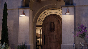 The front door of a home is lit up at night with the UHP1020 Industrial Chic Outdoor Wall Light, 10