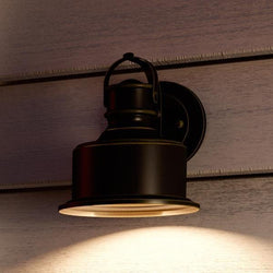 A unique lighting fixture, the UHP1040 Industrial Chic Outdoor Wall Light from Urban Ambiance adds a beautiful touch to any wooden wall with its Olde Bronze Finish, 10"H x