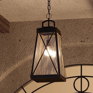 A unique outdoor pendant, the Urban Ambiance UHP1058 English Tudor, adds a touch of luxury to any archway with its Olde Bronze finish from the Saint Paul Collection.