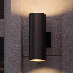 A unique UHP1066 Contemporary Outdoor Wall Light from the Hollywood Collection by Urban Ambiance on the side of a building.