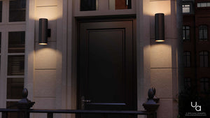 A luxurious black door adorned with two UHP1066 Contemporary Outdoor Wall Lights from the Hollywood Collection by Urban Ambiance.