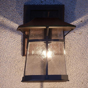 A unique Urban Ambiance UHP1072 Rustic Outdoor Wall Light with a gorgeous lighting fixture.