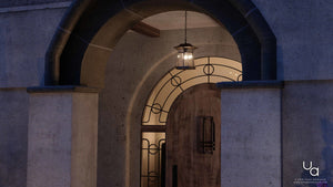 A unique 3D model of a UHP1074 Rustic Outdoor Pendant Light from the Gold Coast Collection by Urban Ambiance, featuring a Coffee Bronze Finish, on a door.