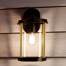 A luxurious Urban Ambiance UHP1090 Vintage Outdoor Wall Light, 16-1/2"H x 9-3/4"W, Architectural Bronze, Durham Collection illuminating