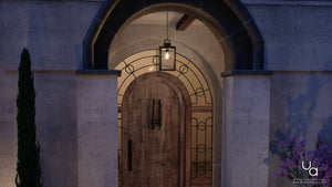 The front door of a house is lit up with a unique Art Deco outdoor pendant light.