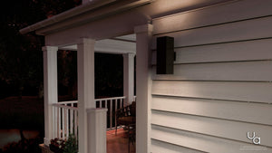 An image of a porch with a UHP1111 Minimalist Outdoor Wall Light from the Madrid Collection by Urban Ambiance.