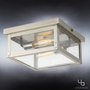 The Urban Ambiance UHP1133 Modern Farmhouse Outdoor Ceiling light from the Darwin Collection features a sleek, square design with exposed bulbs and a stainless steel finish, measuring 5-1/2″H x 12-3/8″W, shown mounted against a gradient gray background.