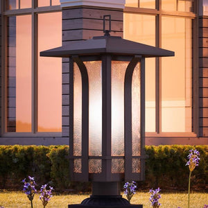 A unique and gorgeous Urban Ambiance UHP1150 Craftsman Outdoor Post / Pier Light, 22-3/4" x 11", Olde Bronze Finish, Essen Collection with flowers in
