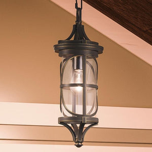 A beautiful Outdoor Pendant Lighting fixture, from the Brussels Collection, hanging from a ceiling in a room.