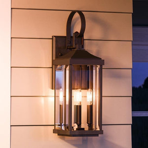 An Urban Ambiance UHP1194 Colonial Outdoor Wall Light with two lights on it, measuring 30-5/8" x 9-1/2" and featuring an Olde Bronze Finish from the Calderdale Collection.