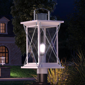 A beautiful Urban Ambiance UHP1220 Colonial Outdoor Post/Pier Light, 20"H x 9"W, Stainless Steel Finish, Longmont Collection lantern on a post in front of