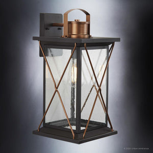 An unique Colonial Outdoor Wall Light with a Olde Bronze finish and clear glass, from the Longmont Collection by Urban Ambiance.