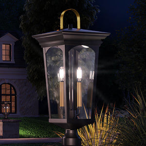 A luxury lamp post from the Urban Ambiance brand illuminates a gorgeous house at night.