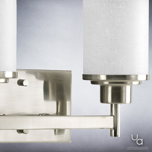 A beautiful lighting fixture, UHP2010 Contemporary Bathroom Vanity Light, with a white shade by Urban Ambiance.