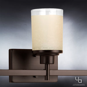 Elevate your bathroom lighting with the Urban Ambiance UHP2013 Contemporary Bathroom Vanity Light from the Cupertino Collection, featuring a frosted cylindrical glass shade and a dark metal base in an Olde Bronze finish. Measuring 9.4375″ high by 22″ wide, this wall-mounted fixture is shown against a gradient background—perfect for adding stylish, modern illumination to your space.