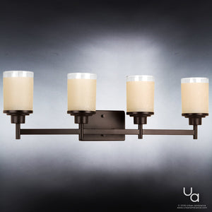 The UHP2015 Contemporary Bathroom Vanity Light by Urban Ambiance features four cylindrical frosted glass shades and a metal base in an Olde Bronze finish, mounted on a rectangular backplate. Measuring 9.4375 inches high by 31 inches wide from the Cupertino Collection, this bath light offers a seamless blend of contemporary and vintage design—perfect for any modern bathroom setting.