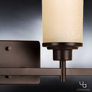 The UHP2015 Contemporary Bathroom Vanity Light from Urban Ambiance’s Cupertino Collection, measuring 9.4375″H x 31″W, features an Olde Bronze finish and a cylindrical frosted glass shade, showcased against a gradient background to highlight its contemporary vintage style.