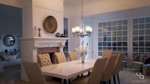 A modern dining room featuring a white table, beige upholstered chairs, a fireplace, wall art, and the Urban Ambiance UHP2017 Contemporary Chandelier (19.75″ H x 20″ W) in a brushed nickel finish from the Cupertino Collection, situated next to a living area with large windows that showcase a cityscape at dusk.