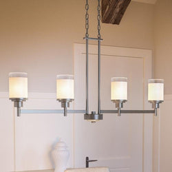 A unique UHP2019 Contemporary lighting fixture in a dining room.