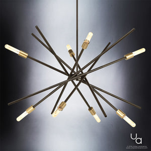 Elevate your space with the Urban Ambiance UHP2070 Modern Industrial Chandelier from the Miami Collection, featuring intersecting black metal rods, exposed bulbs, and a striking Olde Bronze finish—measuring 19-5/8″H x 42-3/8″W—perfect for anyone seeking bold modern vintage lighting.