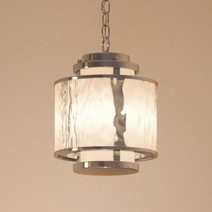 A beautiful Art Deco pendant light with a glass shade hanging from a chain, by Urban Ambiance.