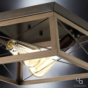 A unique Urban Ambiance UHP2120 Industrial Chic Flush-Mount Ceiling Fixture with two bulbs in it.