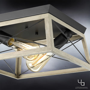 Close-up of the UHP2121 Luxe Industrial Flush-Mount Ceiling Fixture from Urban Ambiance’s Berkeley Collection, featuring a geometric metal frame with a charcoal finish, two exposed bulbs, and a modern design—perfect for adding contemporary rustic lighting to any space. Size: 6″ H x 12″ W.