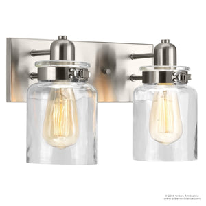 A luxurious lighting fixture with a unique twist, featuring two glass jars, from the Bridgeport Collection.