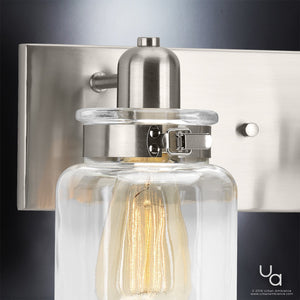 A unique lighting fixture from the Bridgeport Collection by Urban Ambiance featuring a glass jar on the wall.