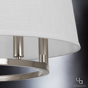Close-up of the Urban Ambiance UHP2182 Cosmopolitan Chandelier from the Marsala Collection, featuring a modern drum shade with a white fabric diffuser and a brushed nickel frame, photographed against a neutral gray background.