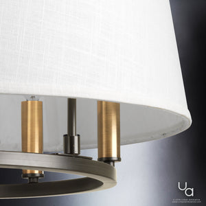 A close up of the unique UHP2183 Cosmopolitan Chandelier by Urban Ambiance, a luxury lighting fixture with a white shade.