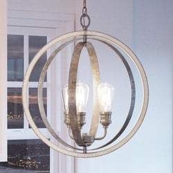 A beautiful Urban Ambiance UHP2213 Vintage Chandelier, 24"H x 21-1/4"W, Galvanized Steel Finish from the Anchorage Collection hanging over a window
