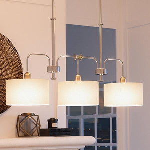 Three UHP2220 Cosmopolitan Island/Linear Chandeliers, 21"H x 38"W, with a Brushed Nickel Finish from the Sheffield Collection by Urban Ambiance hanging as unique