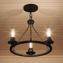 A beautiful and unique UHP2241 Industrial Chic Ceiling Fixture, 15"H x 19-7/8"W, Charcoal Finish from the Nashville Collection by Urban Ambiance with three lights hanging