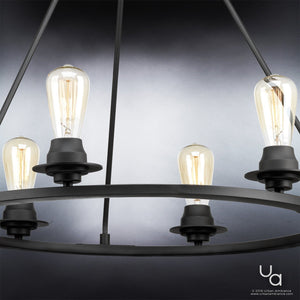 Charcoal-finished UHP2243 Luxe Industrial Chandelier from the Urban Ambiance Nashville Collection, measuring 27-1/2″H x 28″W, features exposed Edison bulbs and vintage-inspired design set against a gradient gray background. Brand logo and website appear in the bottom right corner.